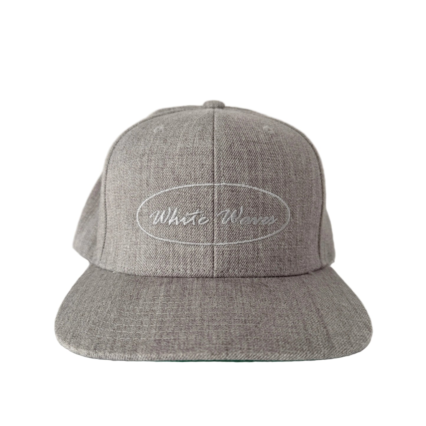 Gray cap with 'White Waves' logo on a white background