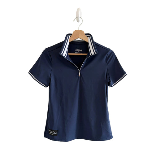 Navy polo shirt with white trim on a hanger against a white background