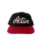 Black and red cap with 'Active' text on a white background