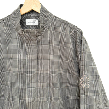 Gray checkered shirt on a hanger with a visible brand label.