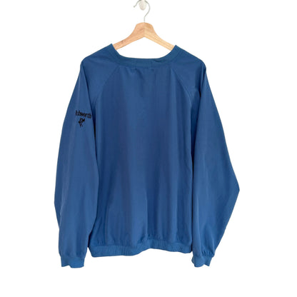 Blue golf windbreaker on a wooden hanger against a white background