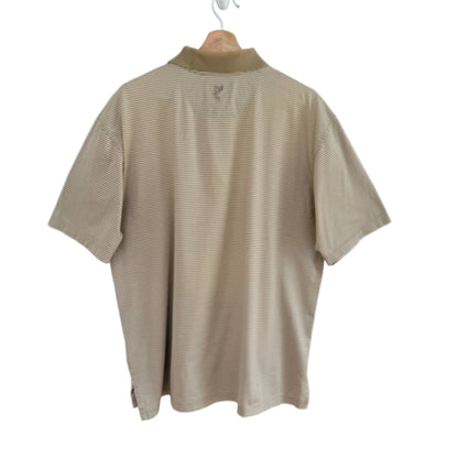 Beige short-sleeve shirt on a hanger against a white background