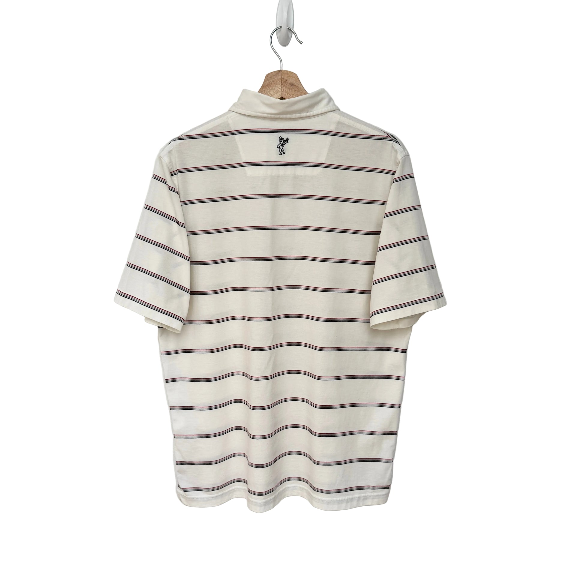 Striped shirt on a hanger against a plain background