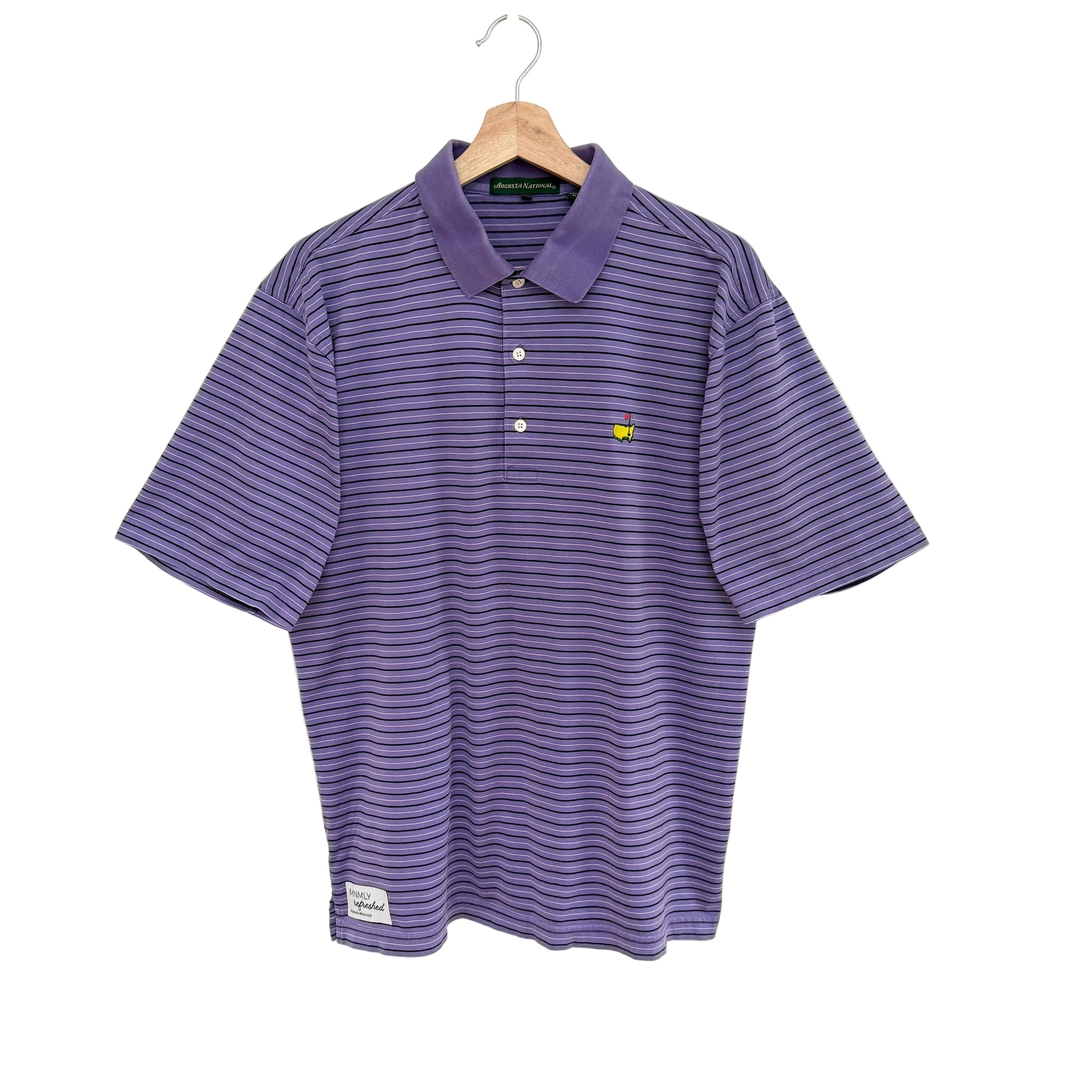 Purple striped polo shirt on a hanger against a white background