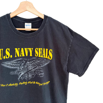 Black t-shirt with U.S. Navy SEALs logo and text on a hanger