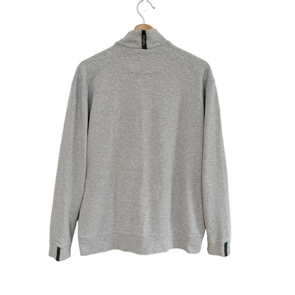 Gray sweater on a hanger against a white background