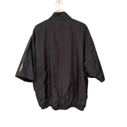 Black jacket on a hanger against a white background