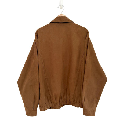 Brown jacket on a hanger against a white background