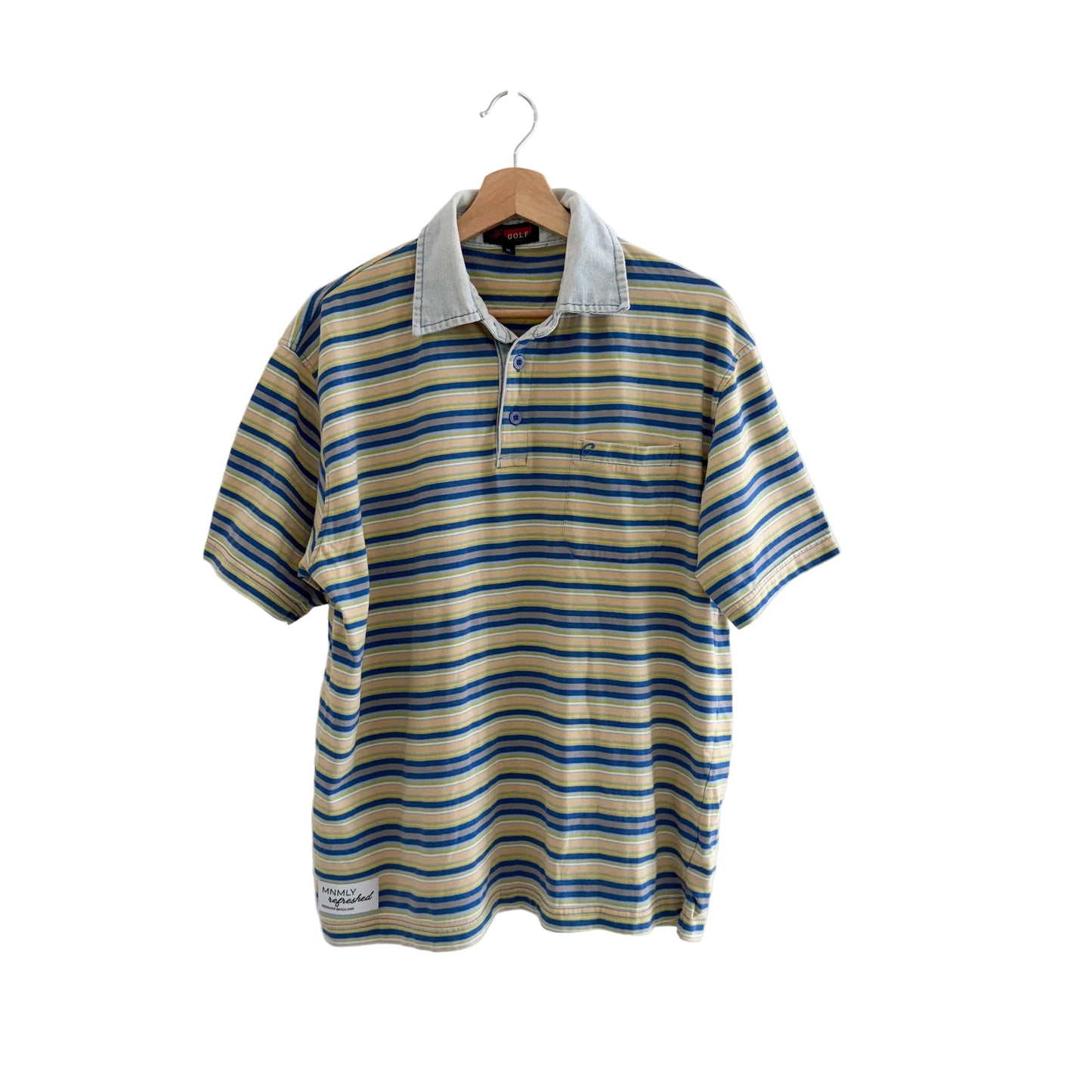 Striped polo shirt on a hanger against a white background