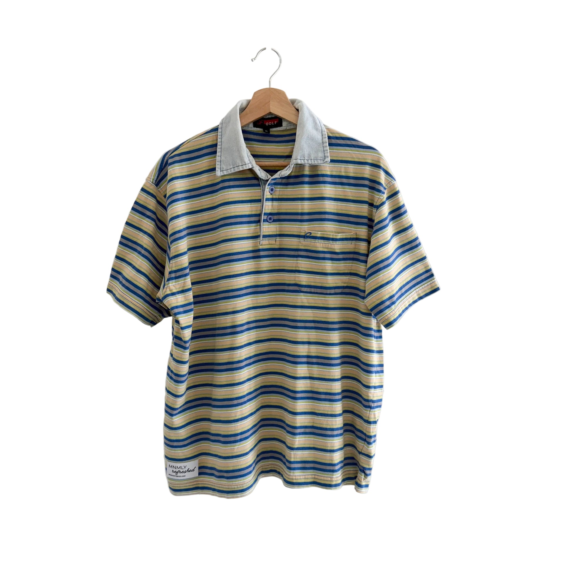 Striped polo shirt on a hanger against a white background
