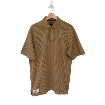 Brown checkered polo shirt on a hanger against a white background