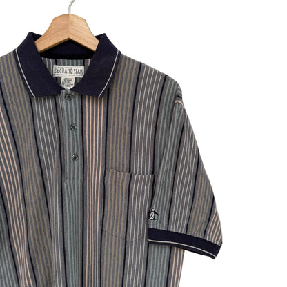 Striped shirt with navy collar and trim on a hanger against a white background