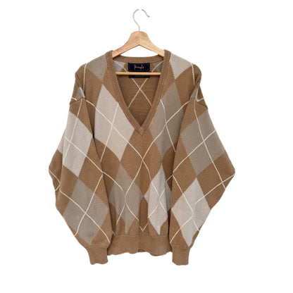 A brown and beige argyle knit sweater with a V-neck and balloon sleeves, hanging on a wooden hanger against a plain white wall.