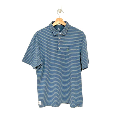 Blue striped polo shirt on a hanger against a white background