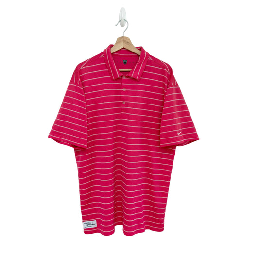 Pink striped polo shirt on a hanger against a white background