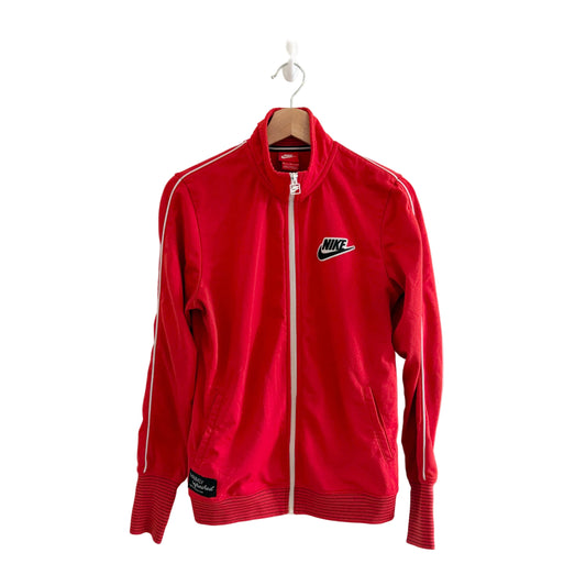 Red Nike tracksuit jacket on a hanger against a white background