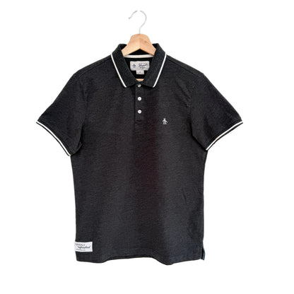 Grey polo shirt with white trim on a hanger against a white background