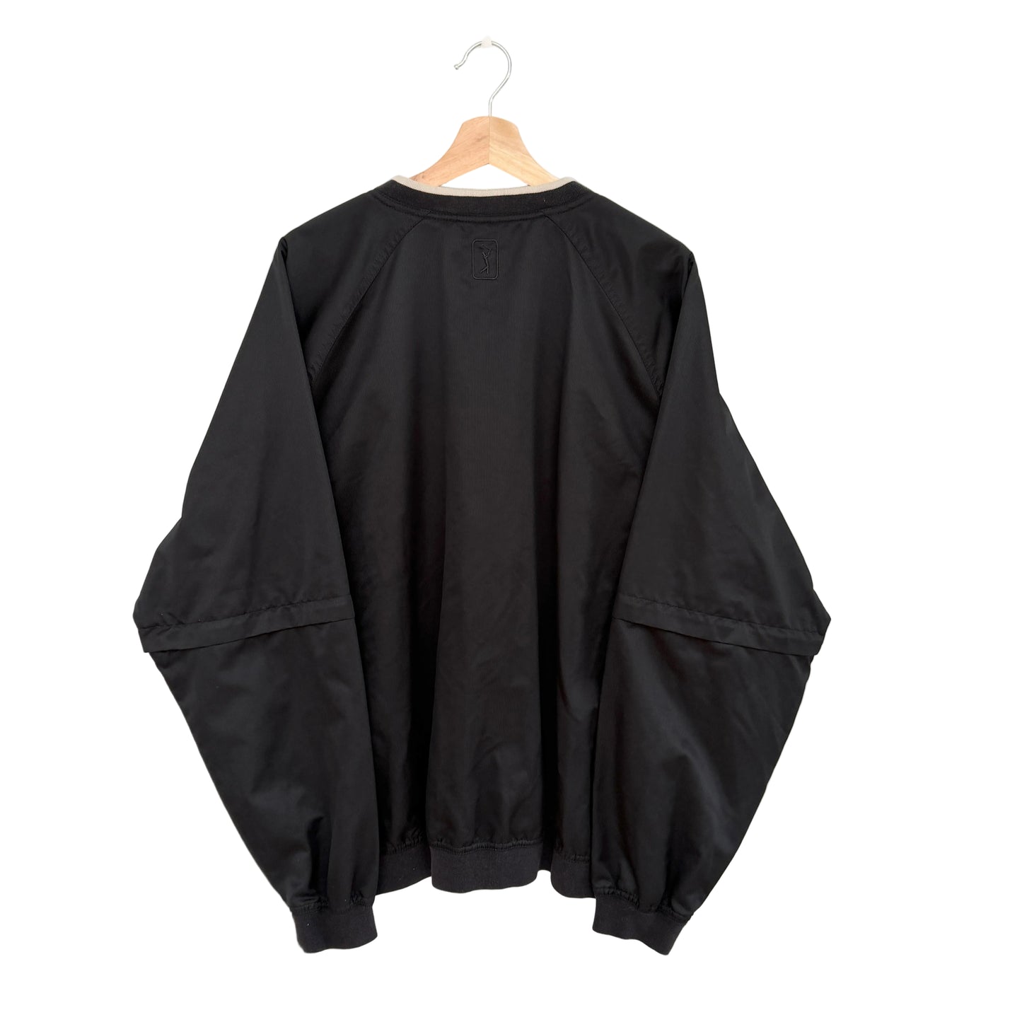 Black jacket on a hanger against a white background