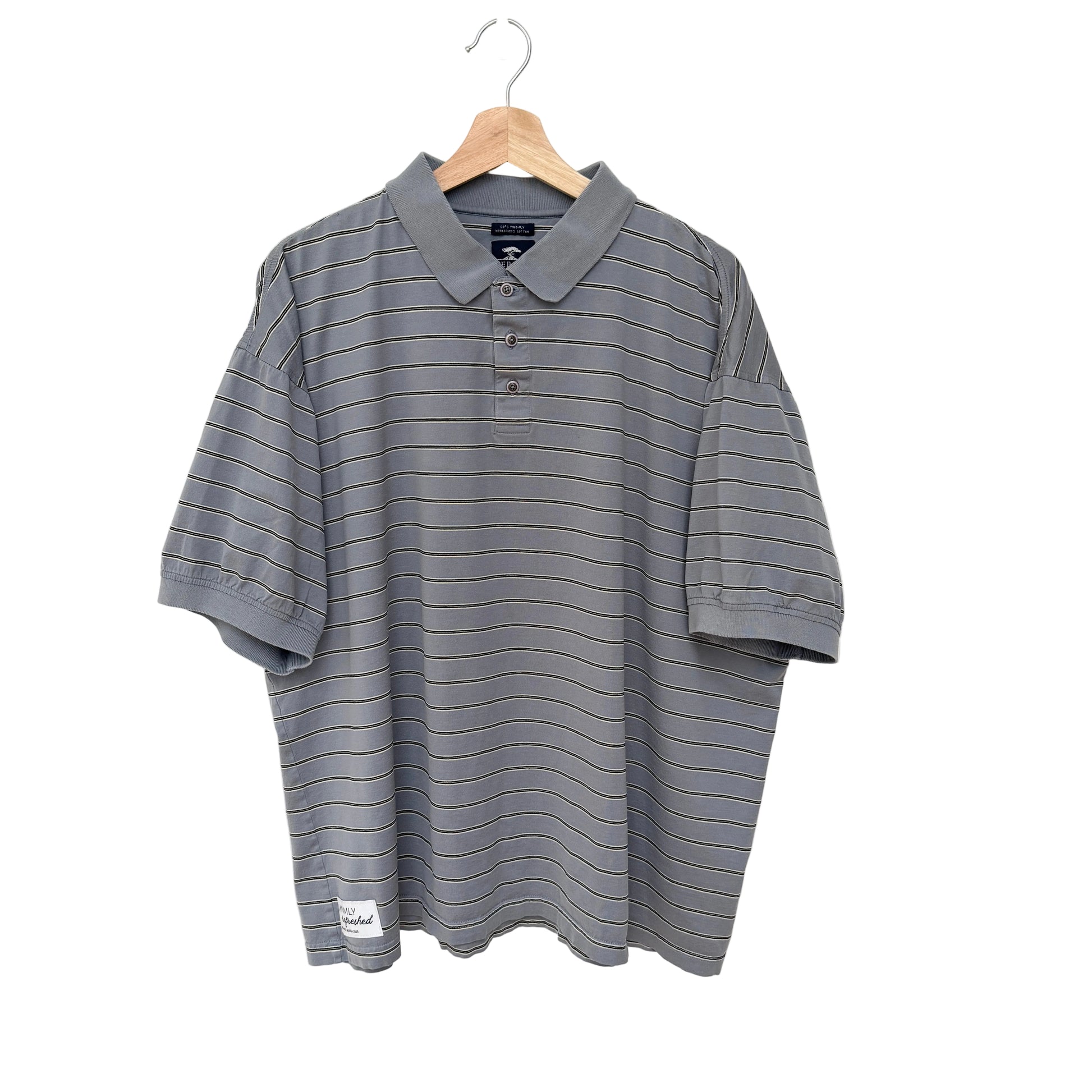 Gray striped polo shirt on a hanger against a white background