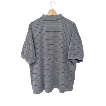 Gray striped shirt on a hanger against a white background