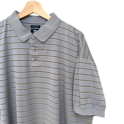 Gray striped polo shirt on a wooden hanger against a white background
