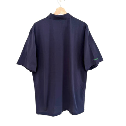 Navy blue polo shirt on a hanger with 'Polo' branding.