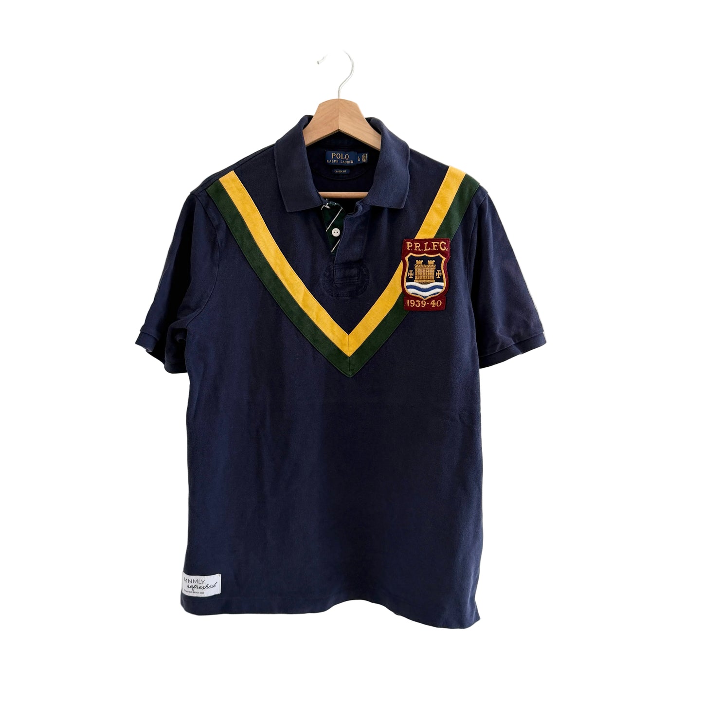 Navy blue polo shirt with a colorful collar and logo on a white background