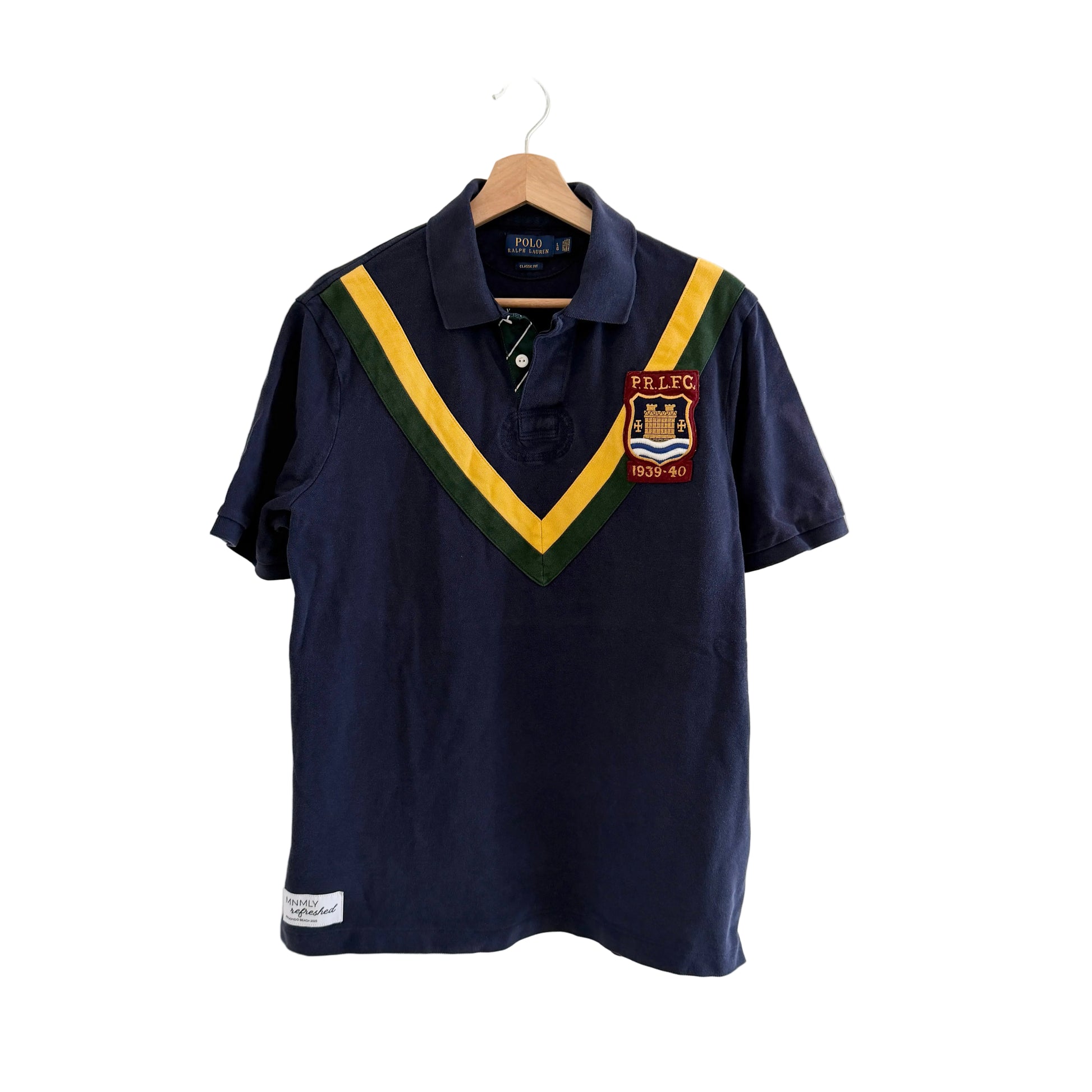 Navy blue polo shirt with a colorful collar and logo on a white background
