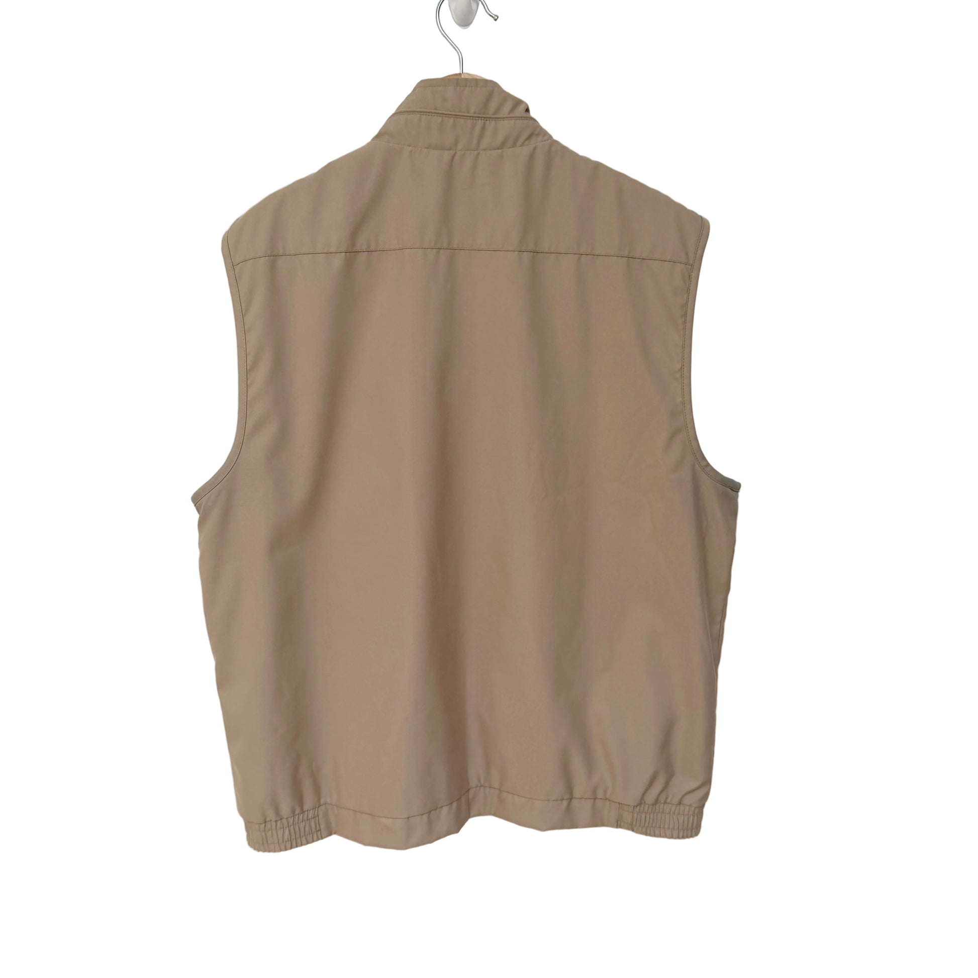 Beige vest on a white background