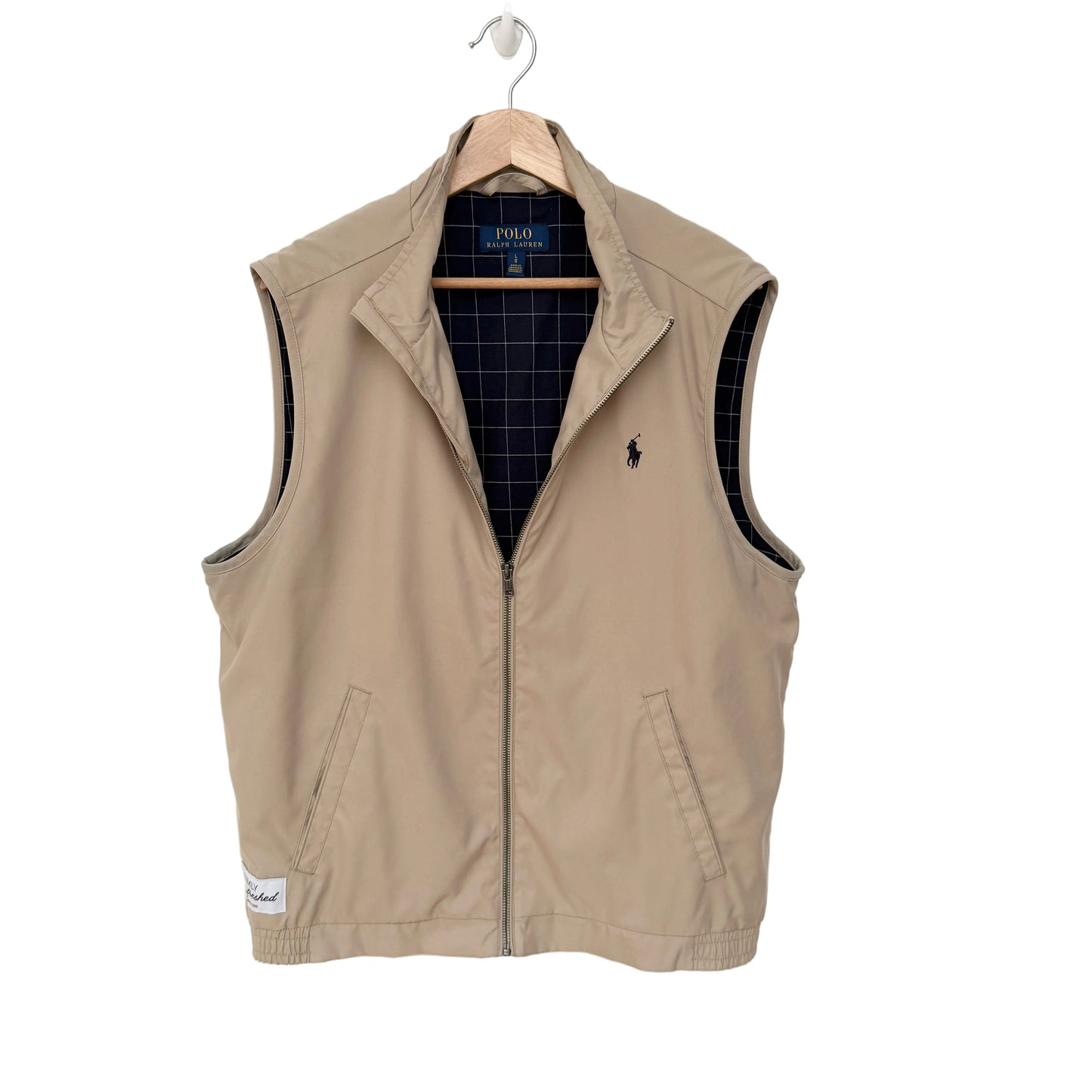 Beige vest with a brand logo on a white background