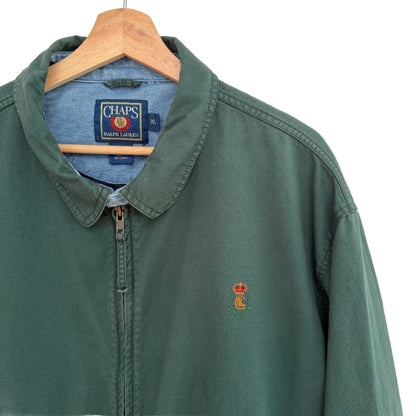 Green jacket with a logo on a hanger against a white background