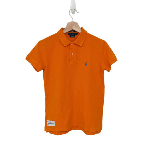 Orange polo shirt with a brand logo on a hanger against a white background
