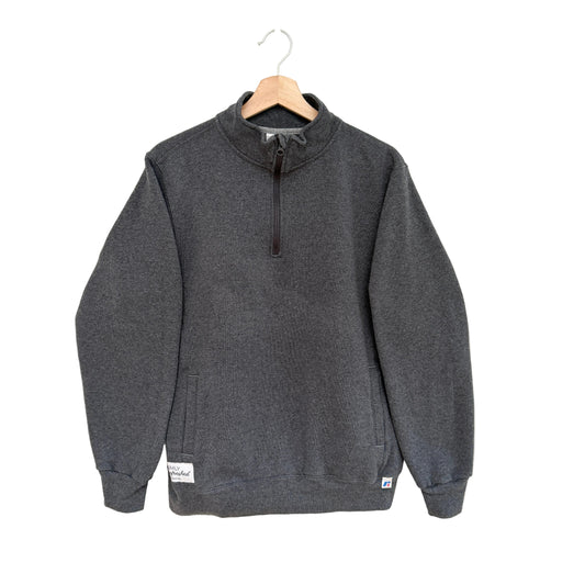 Gray sweatshirt with a quarter zip on a hanger against a white background