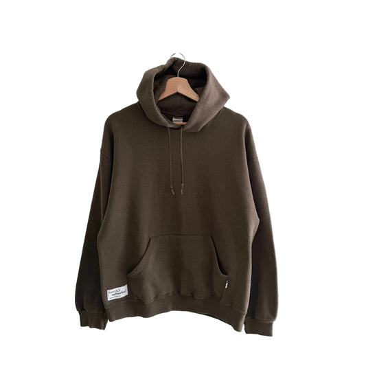Brown hoodie on a hanger against a white background