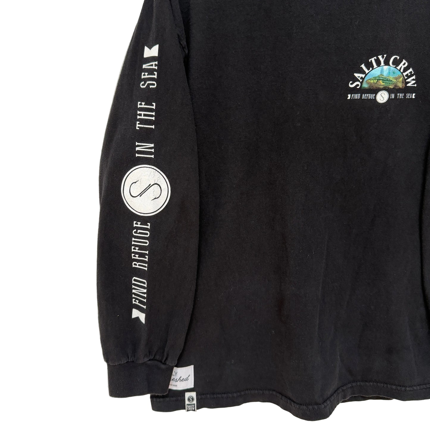 Black long-sleeve shirt with Salty Crew logo and text on a white background