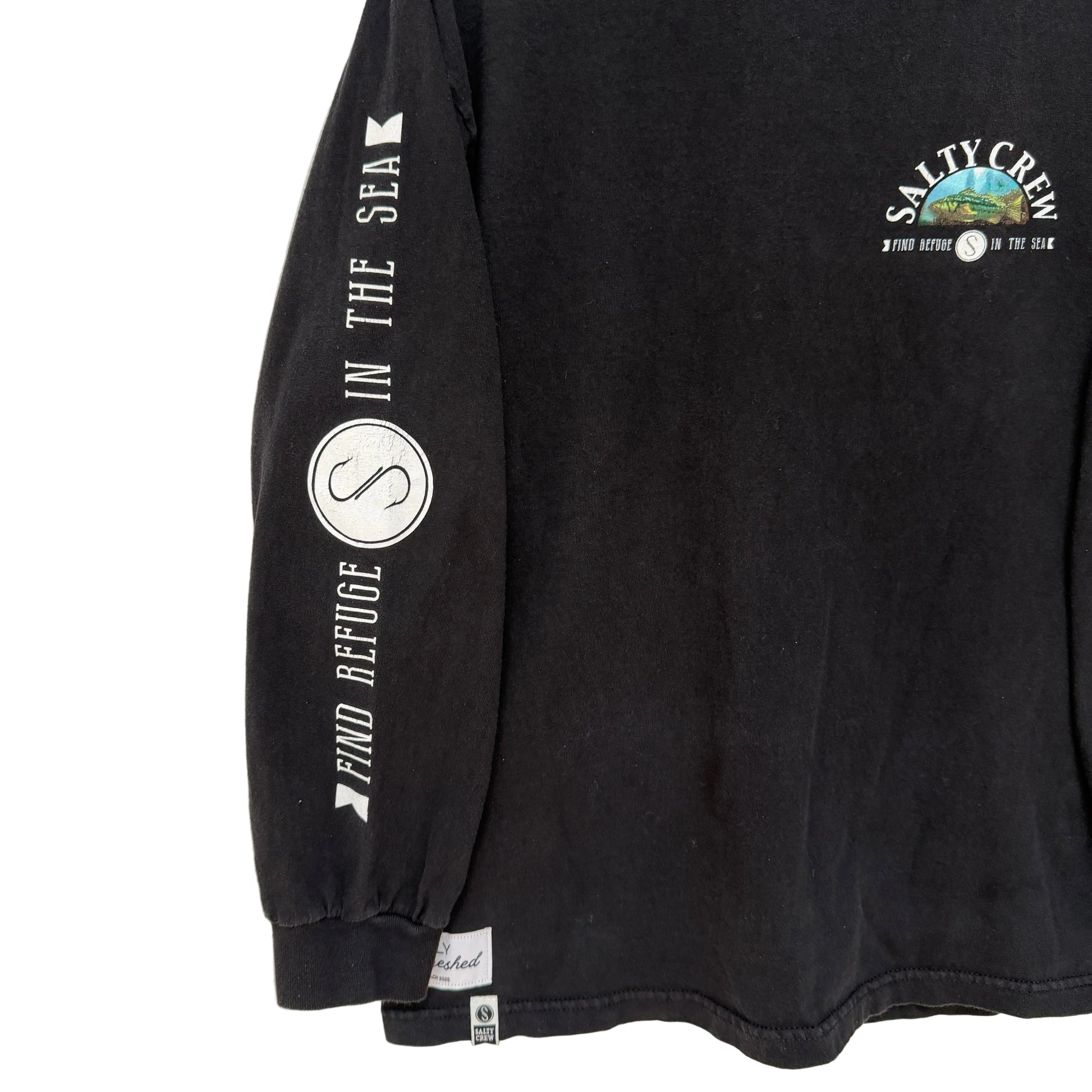 Black long-sleeve shirt with Salty Crew logo and text on a white background