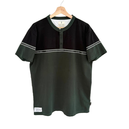 Black and green baseball jersey on a hanger against a white background