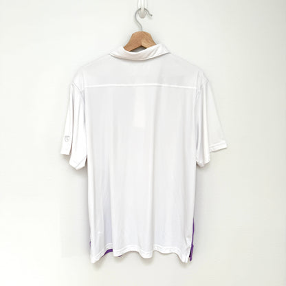 White t-shirt on a hanger against a white background