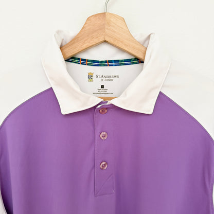 Purple polo shirt with white collar on a hanger against a white background