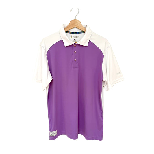 Purple and white polo shirt on a hanger against a white background
