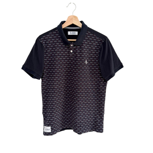 Navy blue polo shirt with a pattern on a hanger against a white background