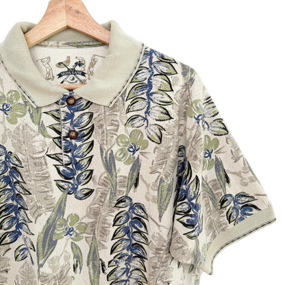 Floral patterned shirt on a hanger with a visible brand label.