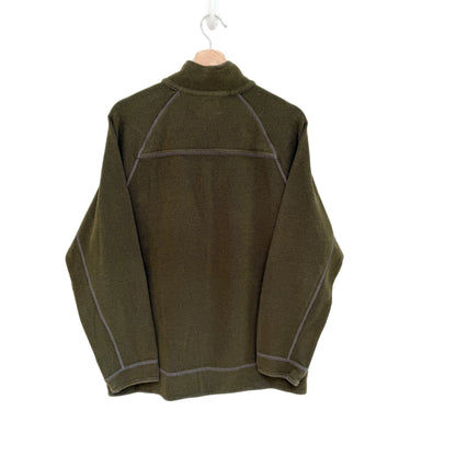 Green fleece jacket on a hanger against a white background