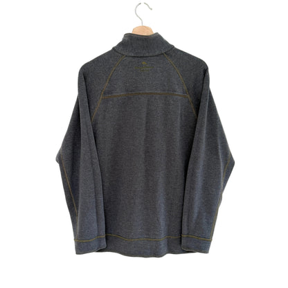 Gray pullover on a hanger against a white background