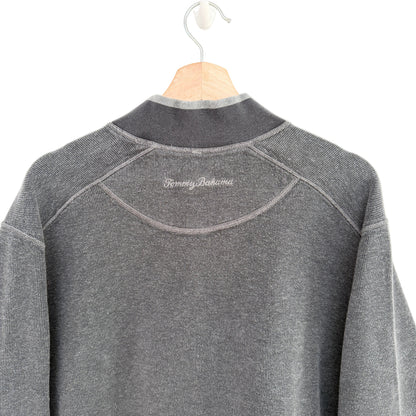 Gray fleece pullover on a hanger with 'Tommy Bahama' branding.