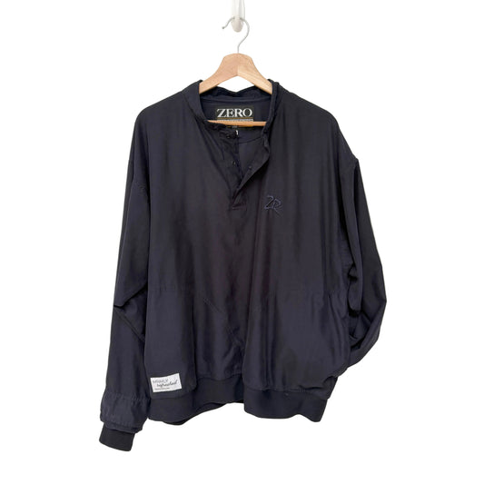 Navy jacket with 'ZERO' branding on a hanger against a white background